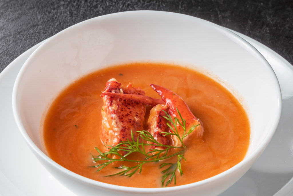 Eating lobster in Maine, try lobster stew, Geddy's for the best lobster stew with fresh lobster meat in Bar Harbor, Maine, it's sure to warm you up on those cold Maine days