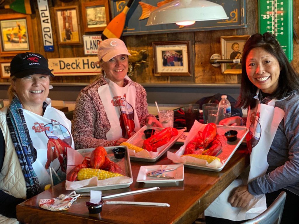 Girls weekend in Bar Harbor with these ladies enjoying Geddy's lobster bakes in Bar Harbor, Maine.