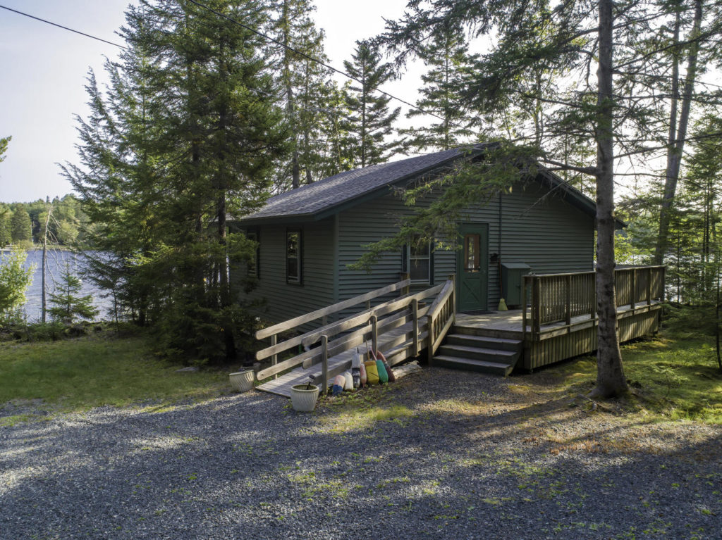 Geddy's blog on Mount Desert Island real estate featuring rustic cabin on water’s edge for sale, Long Pond, Southwest Harbor.
