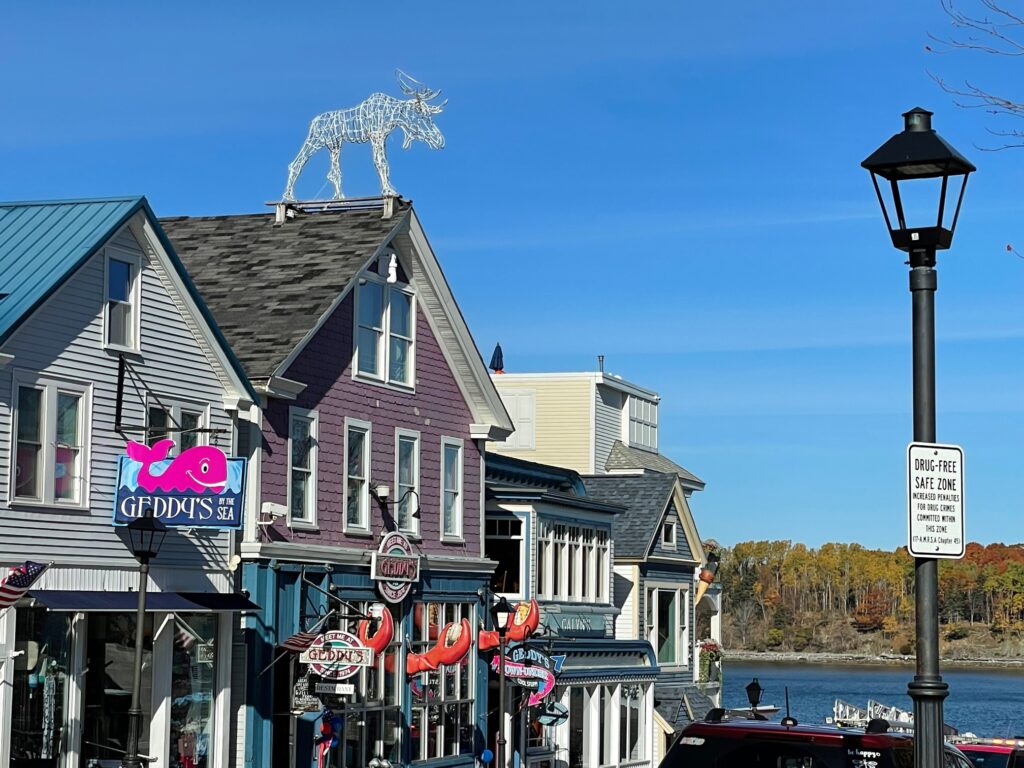 Geddy's Facade with the Moose on the Roof overlooking the harbor in Downtown Bar Harbor Maine