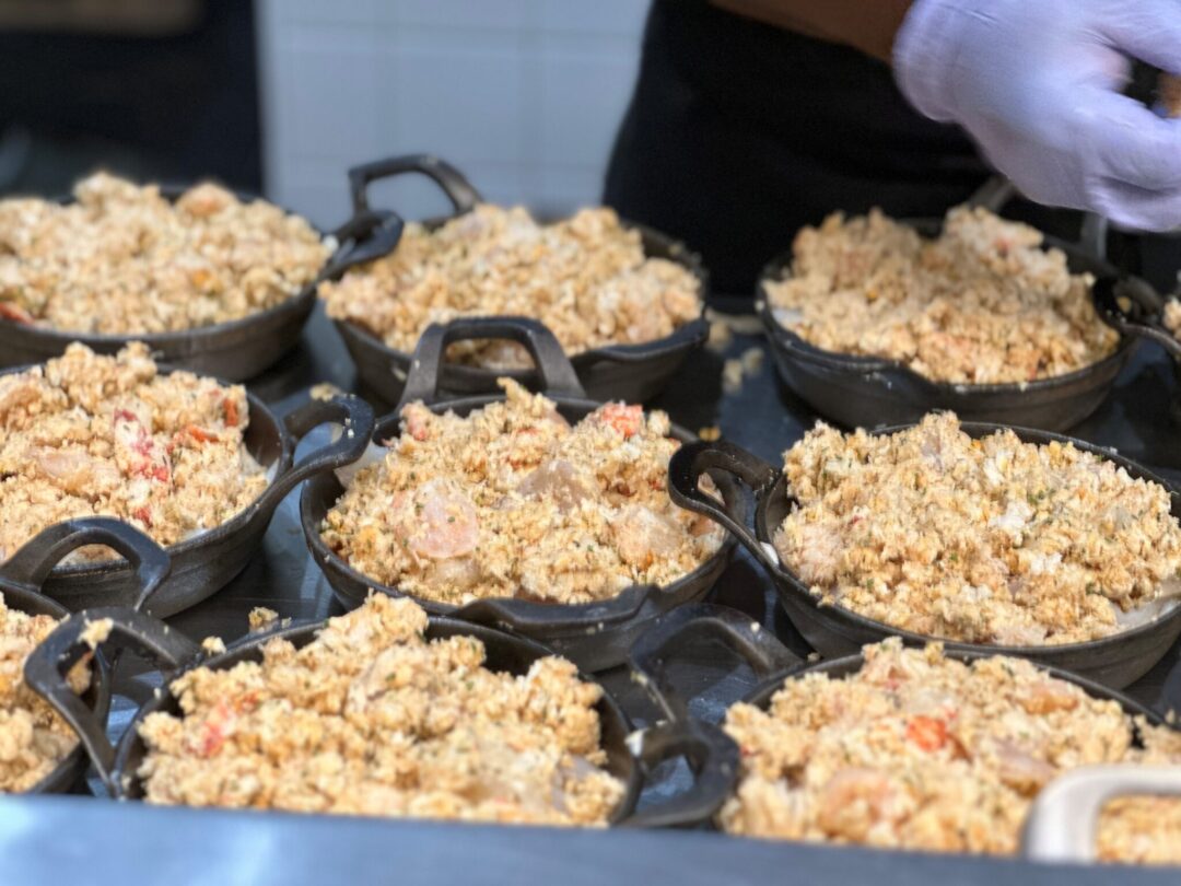 House-made seafood pie being prepared at Geddy's in Bar Harbor, Maine
